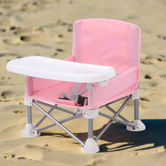 Pink Mini Majesty toddler camping chair set up outdoors, showing soft fabric and sturdy frame.